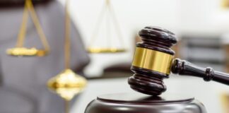 Imponen prisión preventiva a cinco hombres por muerte de dirigente comunitario en Los Alcarrizos