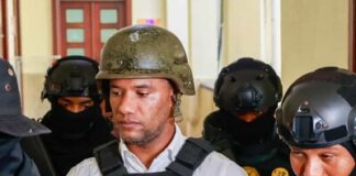 Varían prisión a exfiscal acusado de extorsión en caso SeNaSa, y enfrentará juicio de fondo